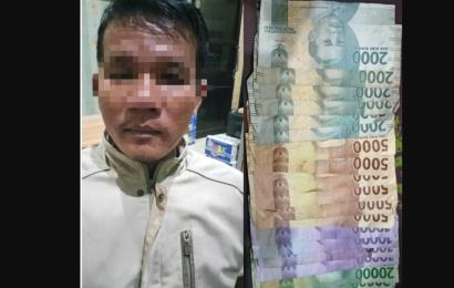 Terduga pelaku bersama barang bukti