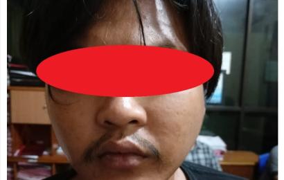 terduga pelaku saat diamankan polisi
