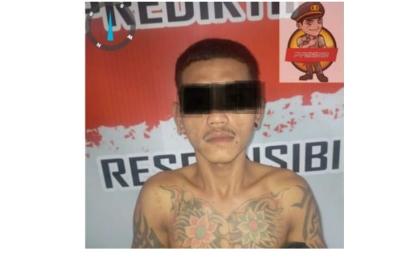 terduga pelaku saat diamankan polisi