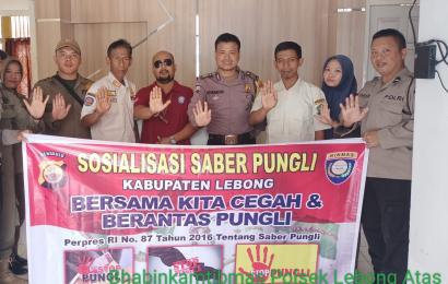 Bhabinkamtibmas Sosialisasi Saber Pungli di Desa Pelabai dan Desa Kota Baru Santan