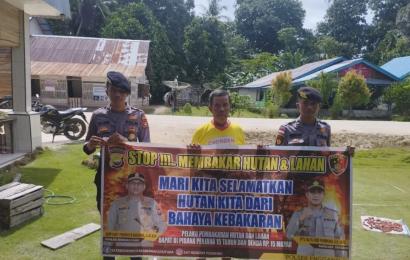 Anggota Polsek Enggano Sosialisasi Cegah Karhutla Kepada masyarakat