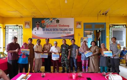Bhabinkamtibmas Polsek Lebong Utara Hadiri Pembagian BLT DD Kemiskinan Ekstrim di Desa Talang Ulu