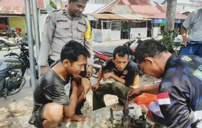 Patroli Siang, Bhabinkamtibmas Polsek Teluk Segara Sambangi Mayarakat Nelayan