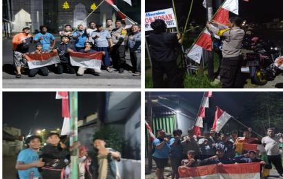 Sambut HUT RI Ke 78, Bhabinkamtibmas Polsek Gading Cempaka Bersama Warga Lakukan Pemasangan Bendera Merah Putih