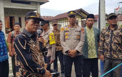 Kapolsek Ujan Mas Hadiri Serah Terima Kunci Rumah Korban Kebakaran