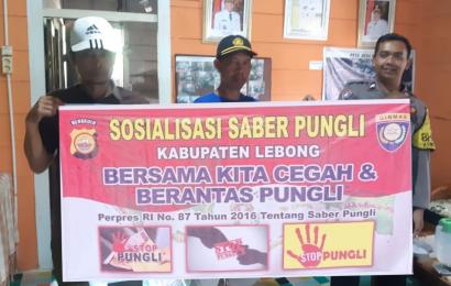 Bhabinkamtibmas Polsek Rimbo Pengadang Sosialisasikan Saber Pungli di Desa Teluk Dien