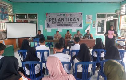 Kasium Polsek Lebong Atas Hadiri Pelantikan Duta Genre di Desa Tik Tebing