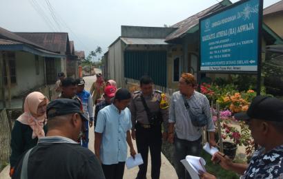 Bhabinkamtibmas Polsek Lebong Utara Hadiri Kegiatan Opname Pembangunan Rabat Beton di Desa Nangai Tayau