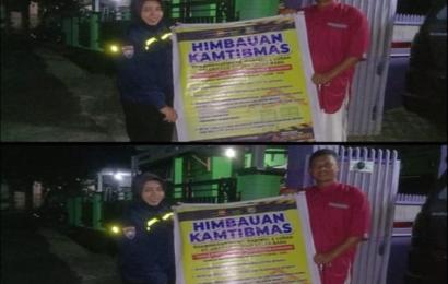 Bhabinkamtibmas Sawah Lebar Berikan Spanduk Imbauan Kamtibmas Kepada Ketua RT 29 