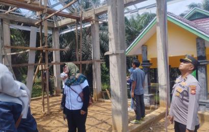 Bhabinkamtibmas Polsek Pino Raya Hadiri Survei Fisik Pembangunan Desa Telaga Dalam 