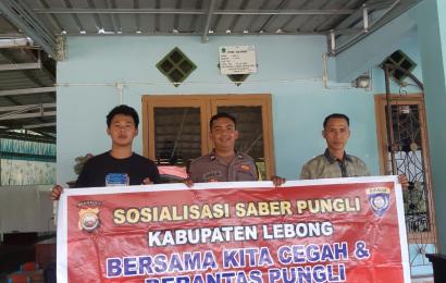 Personel Polsek Rimbo Pengadang Sosialisasi Saber Pungli di Desa Teluk Din