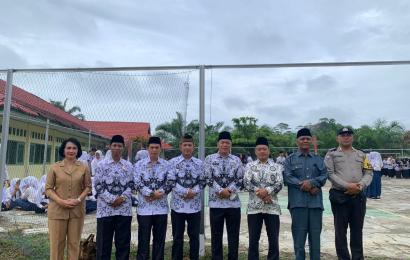 Bhabinkamtibams Hadiri Peringatan HUT PGRI ke-78 dan Hari Guru Nasional