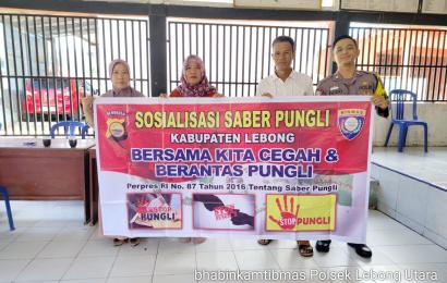 Personel Polsek Lebong Utara Sosialisasi Saber Pungli di Desa Lemeu 