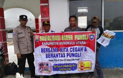 Bhabinkamtibmas Sosialisasi Saber pungli Bersama Warga