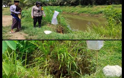 Sambangi Warga, Bhabinkamtibmas Cek Lokasi Tanah yang Tergurus Akibat Hujan Deras