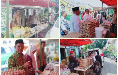 Personel Polsek Ratu Samban Monitoring Operasi Pasar Sembako Murah di Kantor Kelurahan Anggut