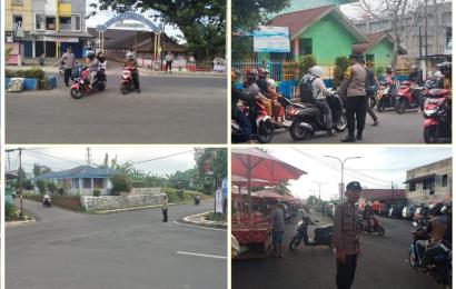 Polsek Ratu Samban Pengaturan Lalin, Tegur Kendaraan yang Melanggar dan Antisipasi Laka Lantas Serta Gangguan Kamtibmas 