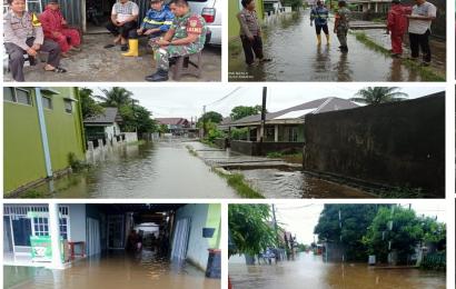 Pasca Hujan Deras, Bhabinkamtibmas Kelurahan Rawa Makmur Cek dan Pantau Luapan Air dari Drainase