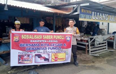 Personel Polsek Lebong Utara Sosialisasi Saber Pungli di  Pasar Tradisional Terminal Kelurahan Amen