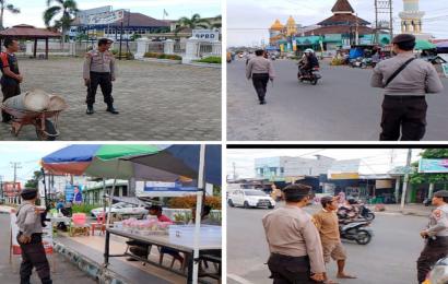 Bhabinkamtibmas Polsek Selebar Monitoring Pasar Kaget, Jaga Kondisfitas di Seputaran Pasar 