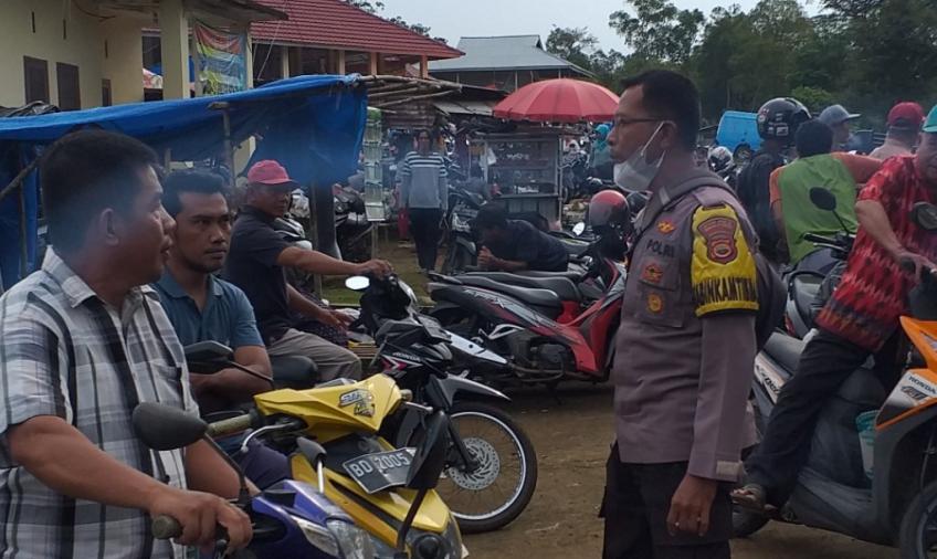 Sambang Pasar, Bhabinkamtibmas Himbau Warga Waspada Tindak Pidana