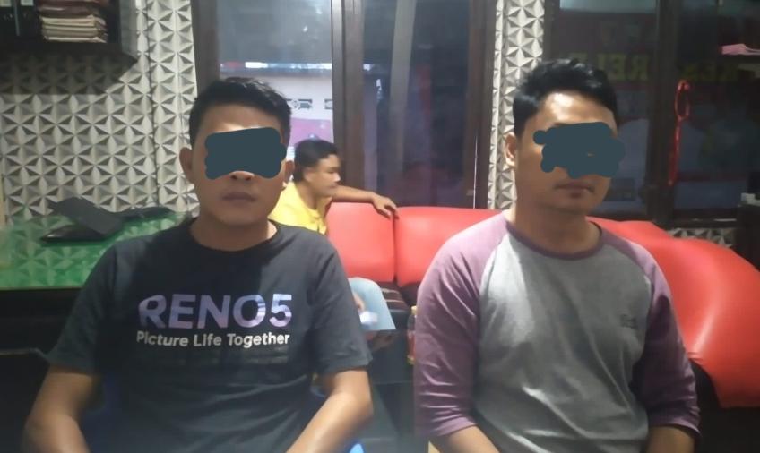 Dua tersangka