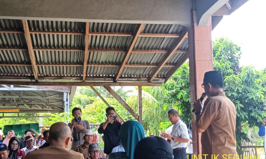Bhabinkamtibmas Hadiri Panen Ikan Patin oleh Bupati Gusnan Mulyadi