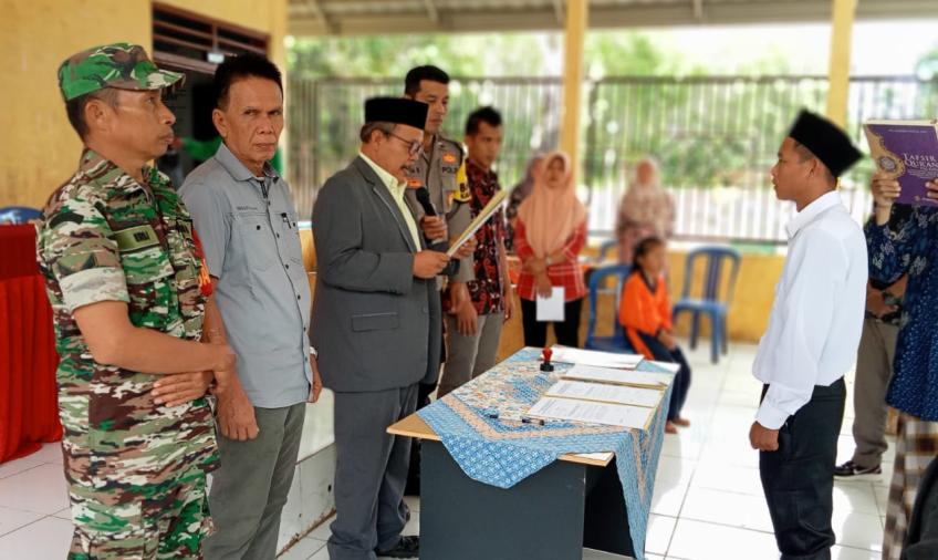 Bhabinkamtibmas Hadiri Pelantikan PAW BPD Lubuk Gedang