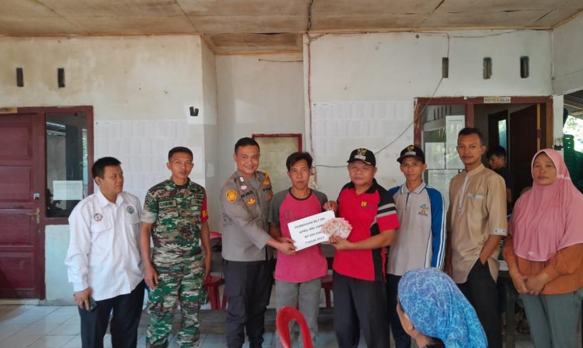 Hadiri Peyaluran BLT-DD di Desa Naga Rantai, Polsek Padang Guci Hulu Berikan Imbaun Kamtibmas 
