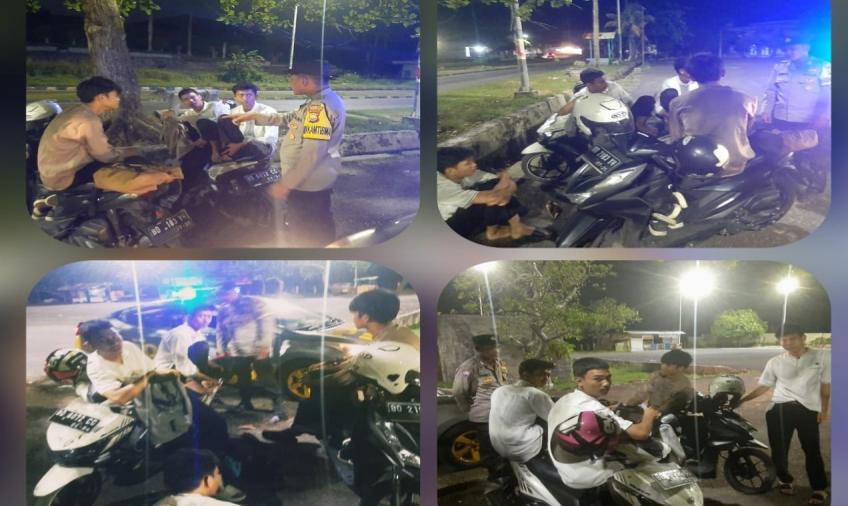 Patroli Malam Hari, Polsek Teluk Segara Berikan Imbaun Kamtibmas kepada Pengunjung Pantai 