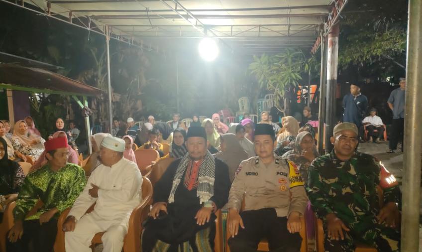 Dikelurahan Sumur Meleleh, Bhabinkamtbmas Polsek Teluk Segara Ikuti Yasinan dan Tahlilan