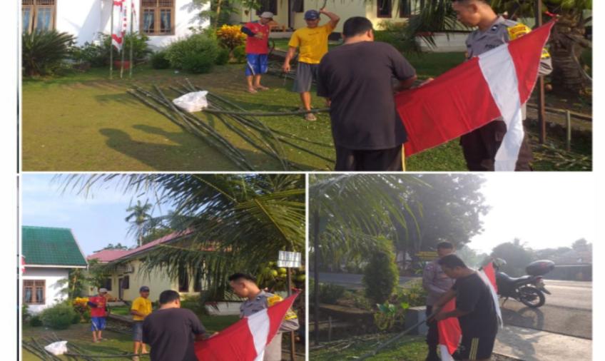 Sambang Silahturahmi, Bhabinkamtimas Muara Bangkahulu Gotong Rotong Bersama Warga Pasang Bendera Umbul-Umbul