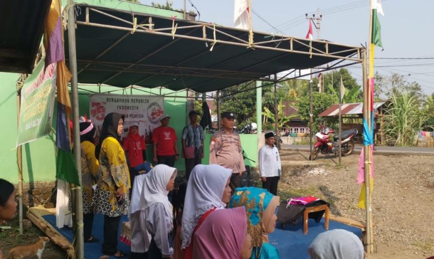 Personel Polsek Taba Penanjung Hadiri Upacara Peringatan HUT RI ke-78 di Desa Bajak 1