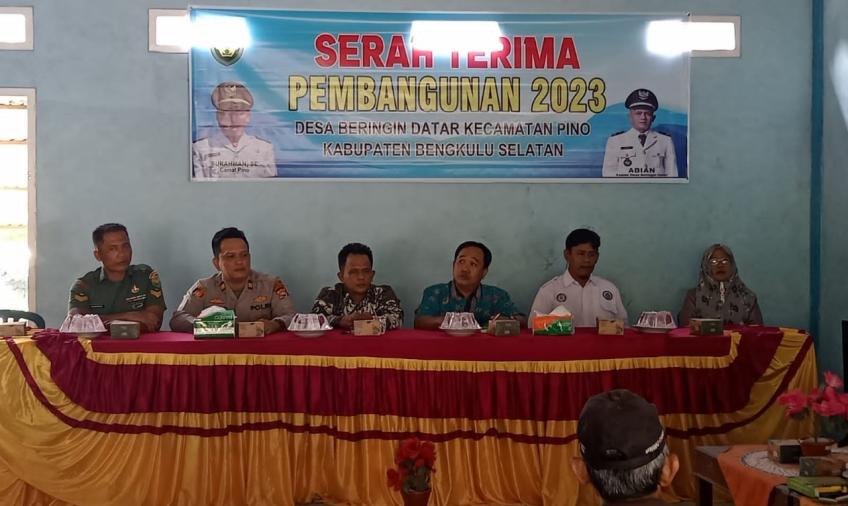 Kapolsek Pino dan Bhabinkamtibmas Hadiri Serah Terima Pembangunan Desa di Kecamatan Pino