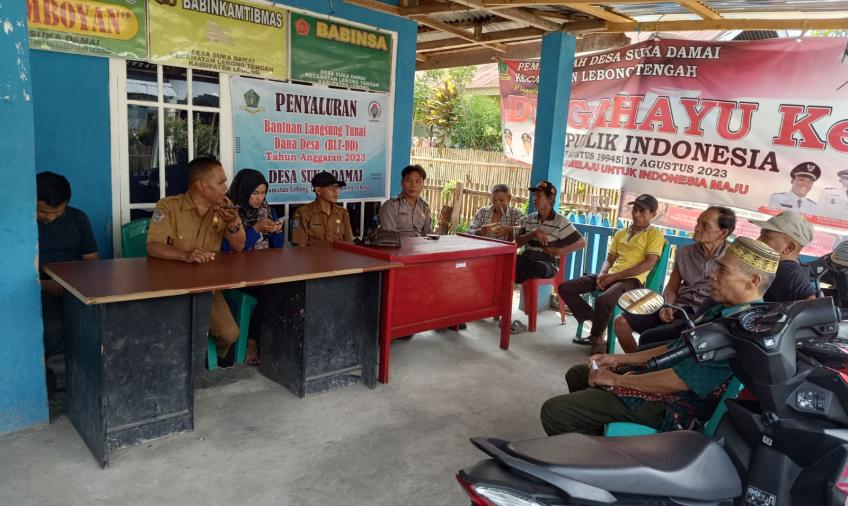 Bhabinkamtibmas Polsek Lebong Tengah Hadiri Titik Nol Pembangunan Jalan Usaha Tani di Desa Suka Damai