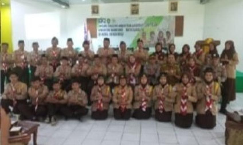 Kanit Binmas Polsek Ratu Samban Hadiri Sosialisasi Pembentukan Karakter dan Pelantikan Kwartir Ranting Ratu Samban