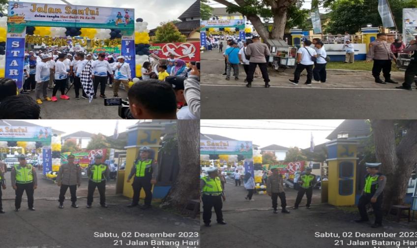 Personel Polsek Teluk Segara Lakukan Pengamanan dan Monitoring Kegiatan Jalan Santai Hari Bakti PU ke-78