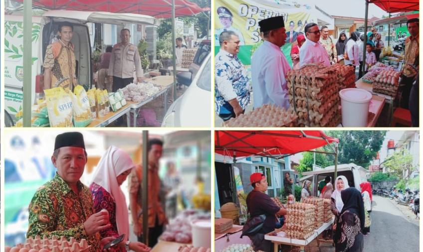 Personel Polsek Ratu Samban Monitoring Operasi Pasar Sembako Murah di Kantor Kelurahan Anggut