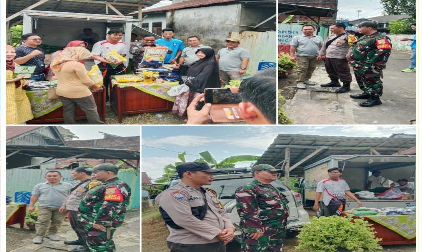 Bhabinkamtibmas Polsek Ratu Samban Monitoring Operasi Pasar Sembako Murah