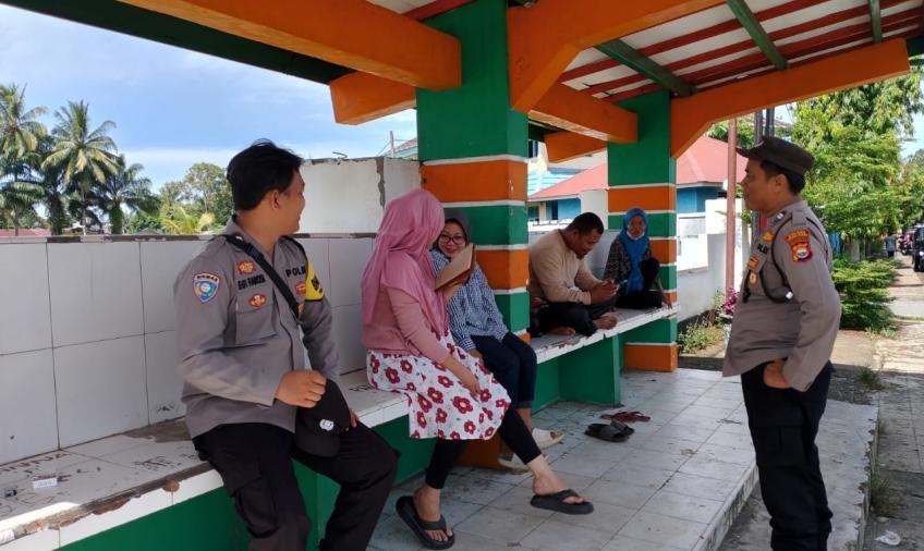 Bhabinkamtibmas Polsek Kota Manna Sampaikan Imbauan kepada Warga di Kelurahan Pasar Baru 