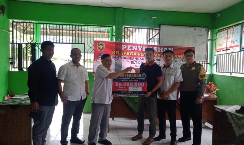 Kapolsek Diwakili Bhabinkamtibmas Hadiri Penyaluran BLT DD  Desa Ganjuh 